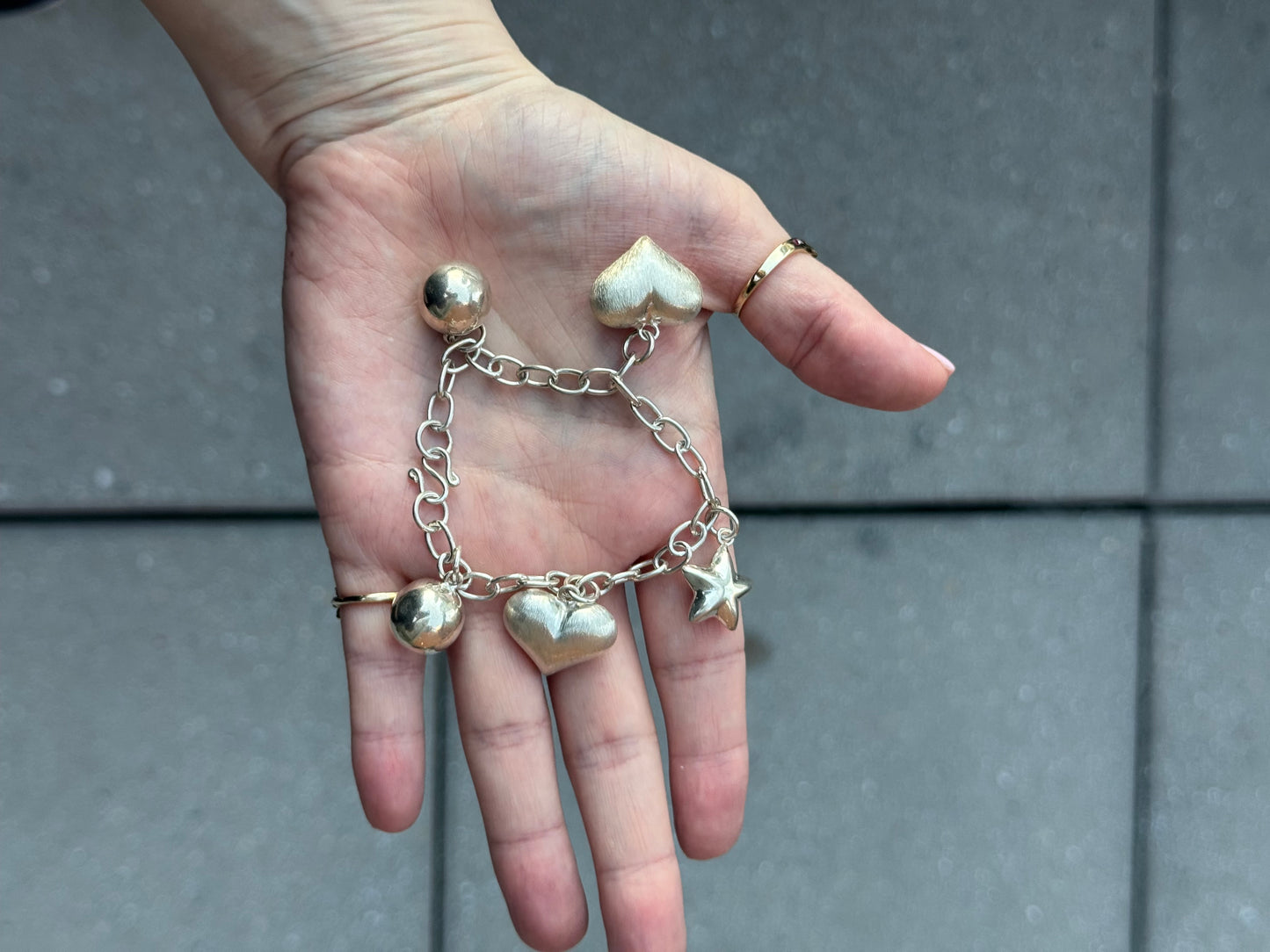 Sterling silver Bracelet with Puffy hearts, puffy star, and balls - Size 6.75