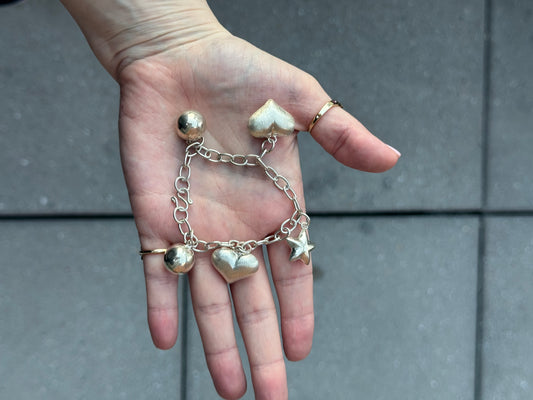 Sterling silver Bracelet with Puffy hearts, puffy star, and balls - Size 6.75